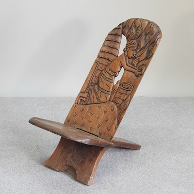 Lot 451 - An African hardwood birthing chair, carved...