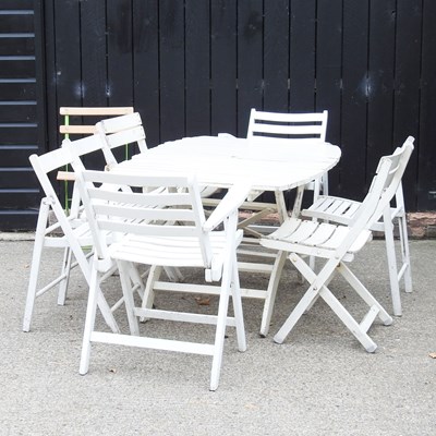 Lot 433 - A white painted folding garden table, together...