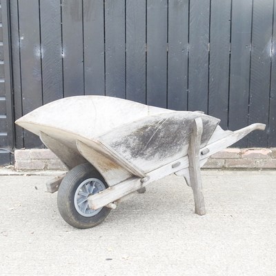 Lot 70 - A wooden garden wheel barrow