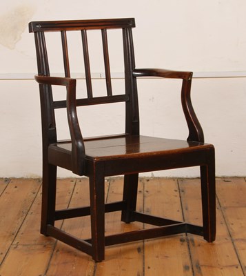 Lot 620 - A 19th century fruitwood stick back open armchair