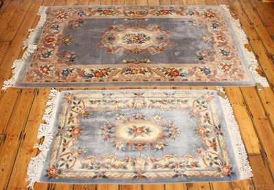 Lot 675 - Two Chinese blue floral woollen rugs
