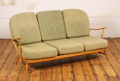 Lot 23 - An Ercol Windsor blonde framed green...