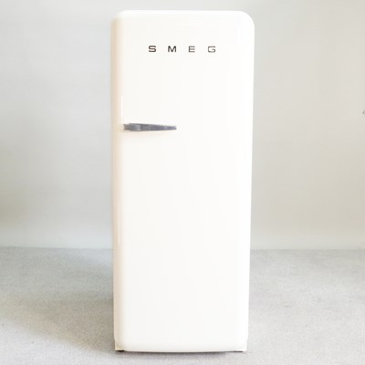 Lot 192 - A cream Smeg fridge
