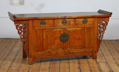 Lot 131 - A large Chinese carved wood sideboard