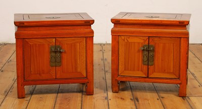 Lot 247 - A pair of Chinese elm low cupboards