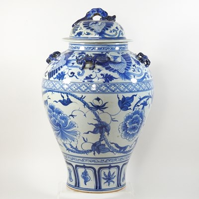 Lot 75 - An Oriental blue and white glazed pottery ginger jar and cover