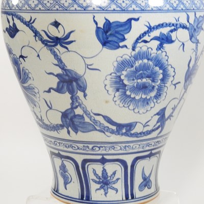 Lot 75 - An Oriental blue and white glazed pottery ginger jar and cover