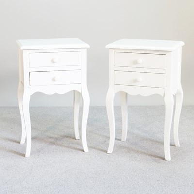 Lot 110 - A pair of white painted bedside chests, each...