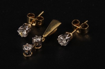 Lot 116 - An 18 carat yellow gold and diamond two stone...