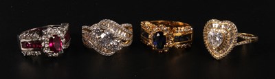 Lot 220 - A yellow metal ring, stamped 14kt, together...
