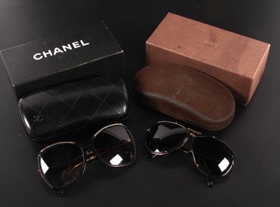 Lot 112 - A pair of ladies Chanel sunglasses, boxed,...