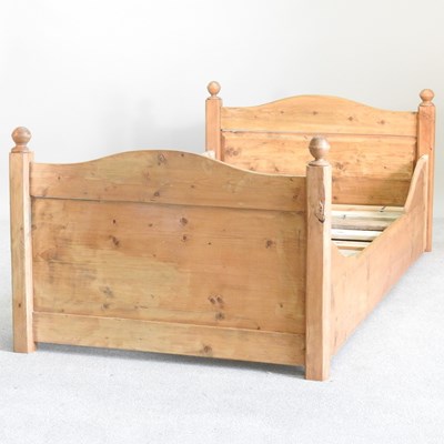 Lot 184 - An antique French pine single bed, with a...