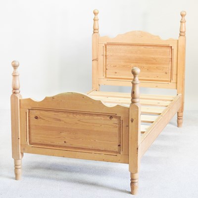 Lot 243 - A French pine single bed, with a slatted...