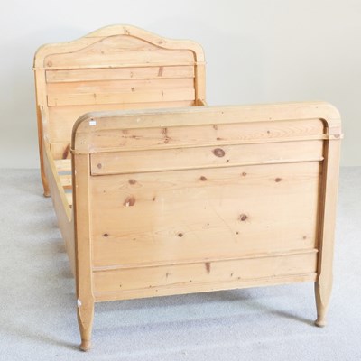 Lot 249 - A French pine single bed, with a slatted...