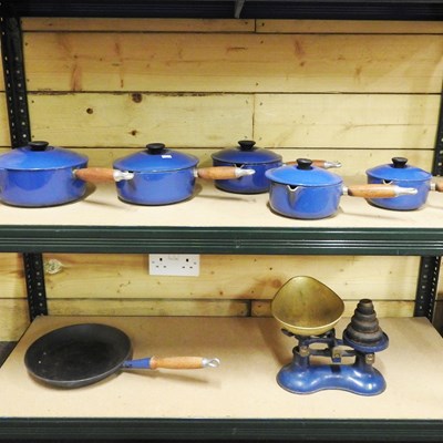 Lot 349 - A set of Le Creuset pans, and a pair of cast...