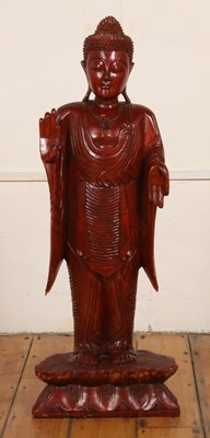 Lot 618 - A large carved wooden standing figure of Buddha