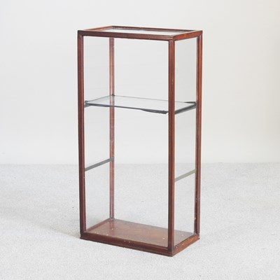Lot 659 - A glazed display case, with glass shelf