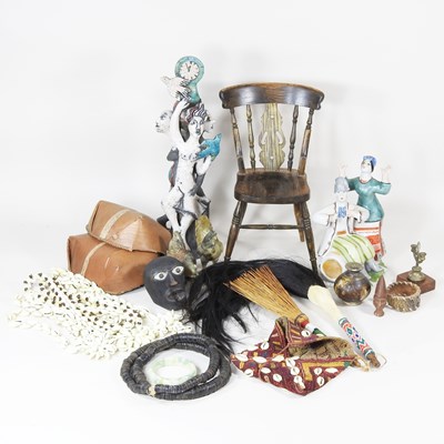 Lot 495 - A collection of ethnic items, to include shell...