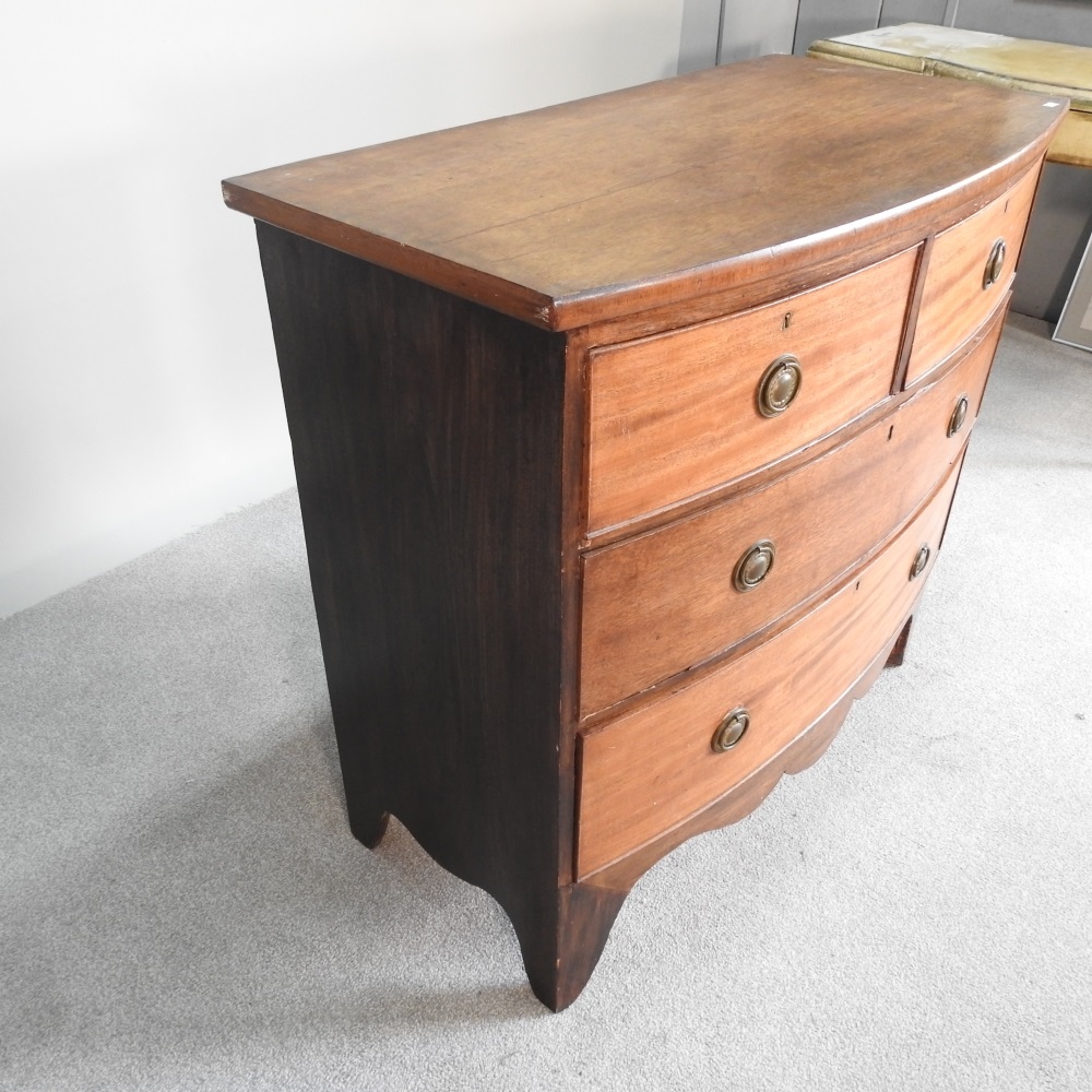 Lot 264 - A small 19th century mahogany bow front