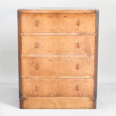Lot 422 - An Art Deco walnut chest of drawers, with...