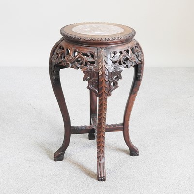 Lot 201 - An early 20th century Chinese carved rosewood...