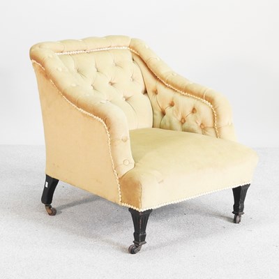 Lot 151 - A Victorian button back armchair, on tapered legs