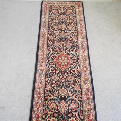 Lot 432 - A Persian mahal runner, with scrolling designs,...