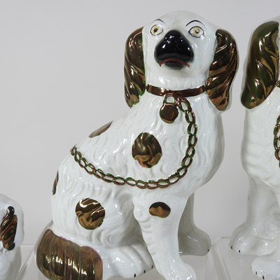 Lot 90 - A pair of Staffordshire pottery spaniels