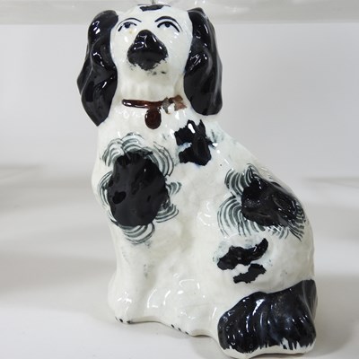 Lot 90 - A pair of Staffordshire pottery spaniels