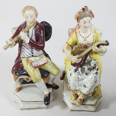 Lot 93 - A pair of early 19th century Staffordshire pottery figures