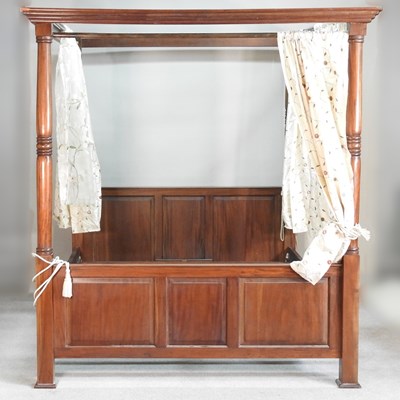 Lot 254 - A Victorian style four poster bed, with fabric...