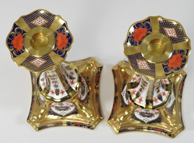 Lot 1 - A pair of Royal Crown Derby 'Old Imari' pattern table candlesticks