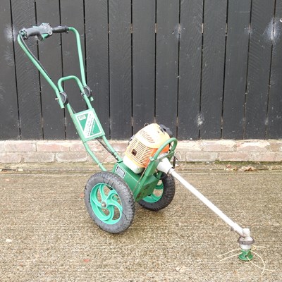 Lot 579 - A Rufcut petrol strimmer