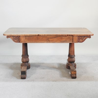 Lot 339 - A 19th century rosewood sofa table, on end...