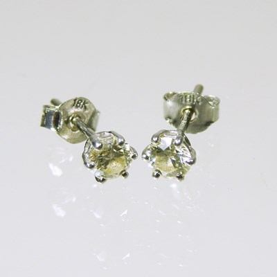 Lot 208 - A pair of 18 carat white gold diamond stud...