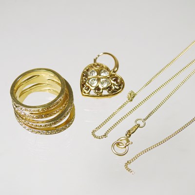 Lot 140 - A Swarovski gilt dress ring, together with a...
