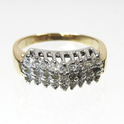 Lot 86 - An unmarked diamond cluster ring, of asngulsr...