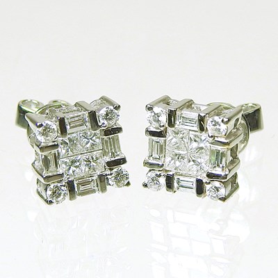 Lot 88 - A pair of 18 carat white gold diamond cluster...