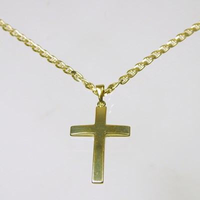 Lot 114 - A 9 carat gold cross pendant, 3cm high, on a 9...