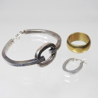 Lot 354 - A silver bracelet, together with an earring...