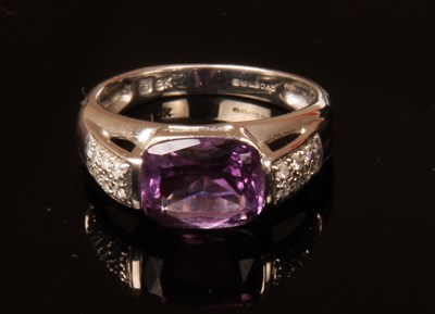 Lot 229 - A 9 carat white gold amethyst and diamond ring,...