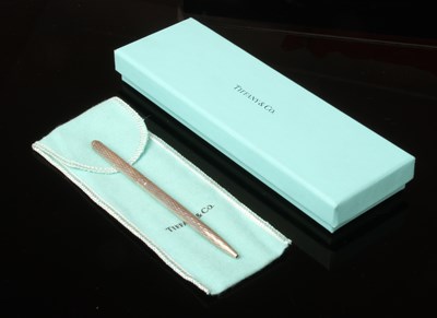 Lot 85 - A Tiffany & Co silver propelling pen, boxed