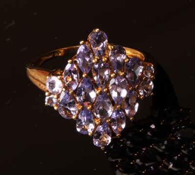 Lot 20 - A 9 carat yellow gold tanzanite cluster ring,...