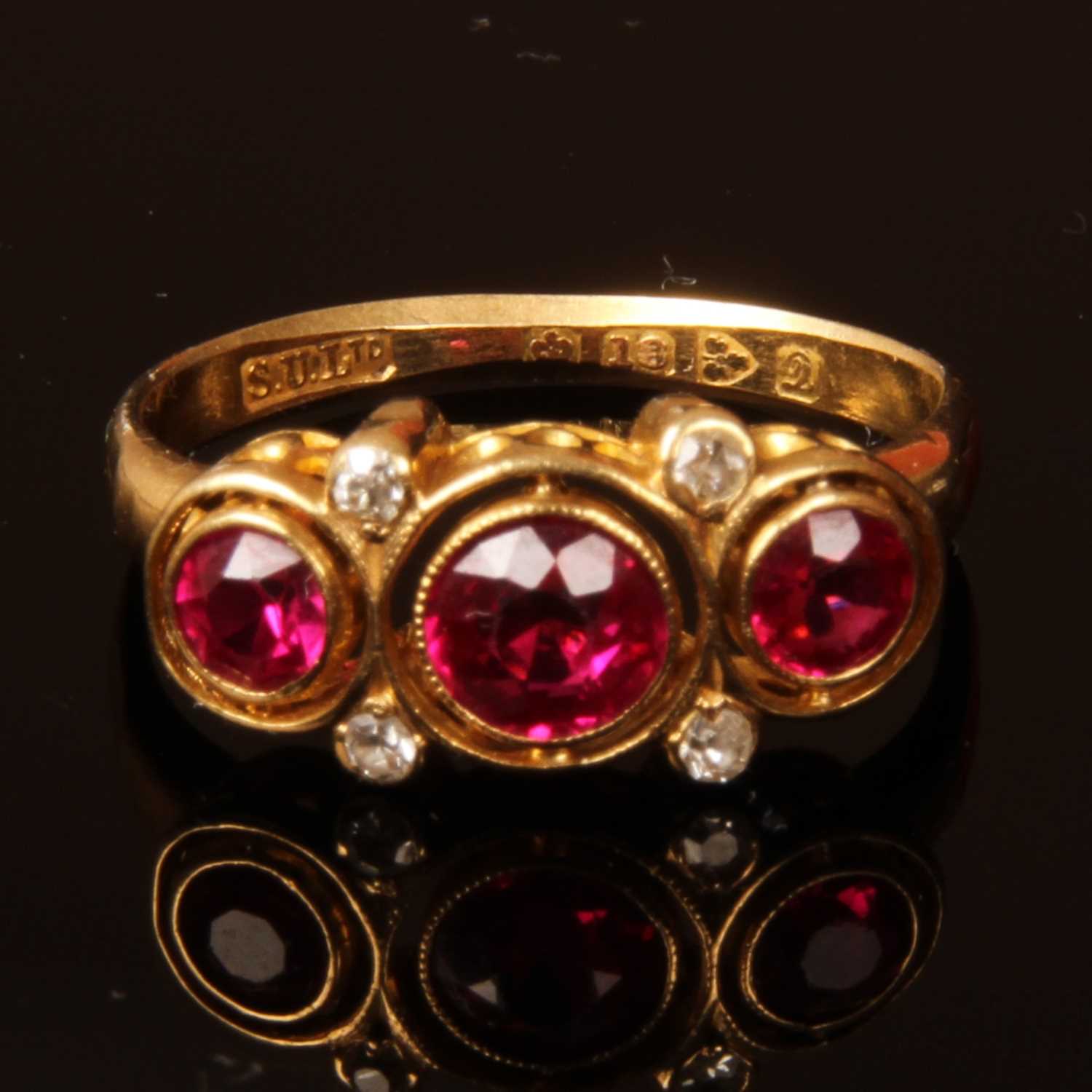 Lot 6 - An 18 carat yellow gold ruby and diamond dress