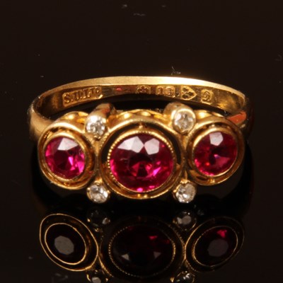 Lot 6 - An 18 carat yellow gold ruby and diamond dress...
