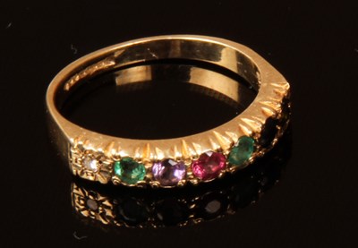 Lot 221 - A 9 carat yellow gold multi-gem set dress ring,...