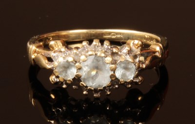 Lot 44 - A 10 carat yellow gold aquamarine and diamond...