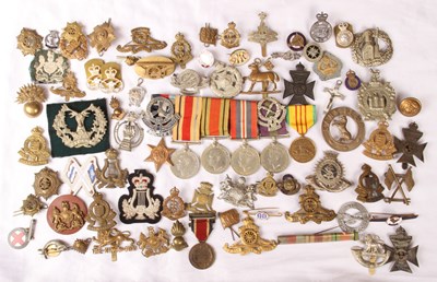 Lot 79 - A large collection of militaria, to include...