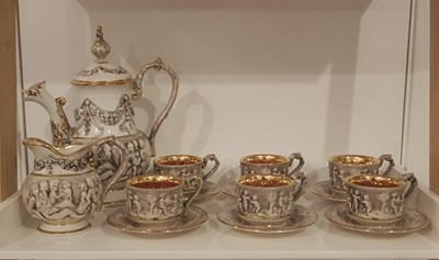 Lot 256 - A Capodimonte six place tea service,...
