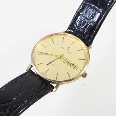 Lot 49 - A 9 carat gold cased wristwatch, the 30mm dial...